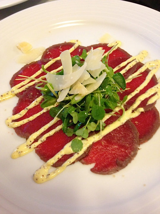 Bison Carpaccio With Dijon Aioli and Micro Greens